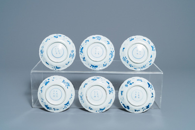 A collection of Chinese and Japanese blue and white cups and saucers and two ewers, Wanli and later