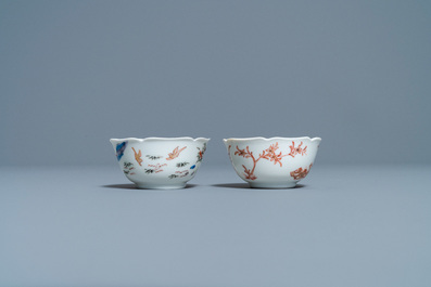 Two Chinese iron-red and gilt cups and saucers, Yongzheng