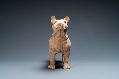 A large Chinese grey pottery model of a dog, Han