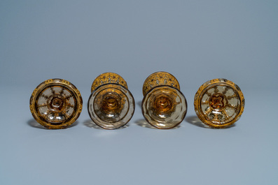 A pair of Russian or Eastern-European gilt copper and glass-inlaid glass goblets and covers, 19th C.