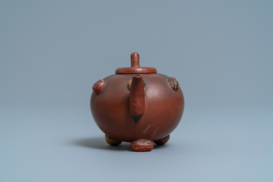 A Chinese Yixing stoneware teapot and cover with applied nuts, 19/20th C.