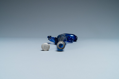 A cobalt blue glass flask in the shape of a flintlock gun, Belgium or Holland, 17th C.