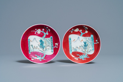 A pair of Chinese famille rose ruby-ground cups and saucers, Yongzheng