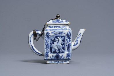 A rare Dutch Delft blue and white relief-moulded teapot and cover, late 17th C.