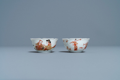 Two Chinese iron-red and gilt cups and saucers, Yongzheng