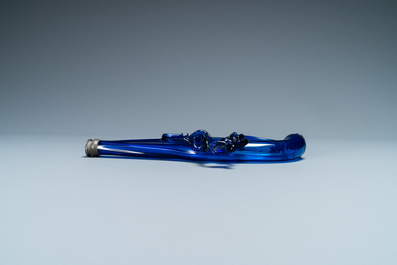 A cobalt blue glass flask in the shape of a flintlock gun, Belgium or Holland, 17th C.