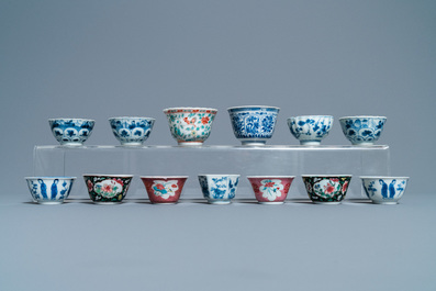Thirteen Chinese blue and white, famille rose and famille verte cups and saucers, Kangxi/Qianlong