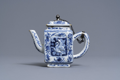 A rare Dutch Delft blue and white relief-moulded teapot and cover, late 17th C.