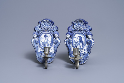 A pair of Dutch Delft blue and white appliques with royalist portraits of prince William IV and princess Anne, 18th C.