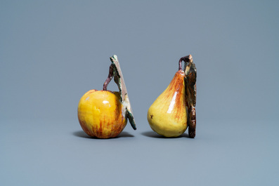 A polychrome Dutch Delft model of an apple and one of a pear, 18th C.