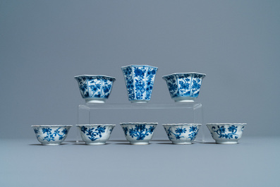Nineteen Chinese blue and white cups and twenty-one saucers, Kangxi and later