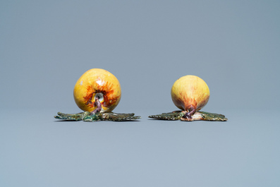 A polychrome Dutch Delft model of an apple and one of a pear, 18th C.