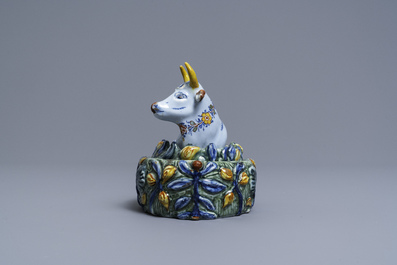 A polychrome Dutch Delft butter tub in the shape of a cow, 18th C.