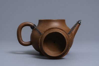 A Dutch Delft redware teapot and cover, ca. 1700