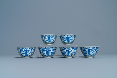 A collection of Chinese and Japanese blue and white cups and saucers and two ewers, Wanli and later