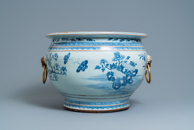A large Chinese blue and white fishbowl with gilt bronze handles, Qianlong