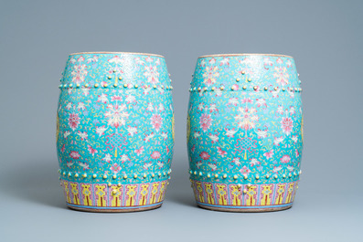 A pair of Chinese turquoise-ground famille rose garden seats, 19th C.