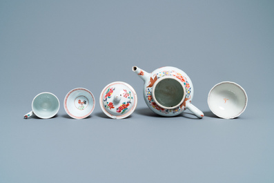 A Chinese famille rose teapot and three cups and saucers, Yongzheng/Qianlong