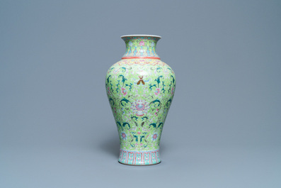 A Chinese famille rose lime-green-ground vase, Qianlong mark, 19/20th C.