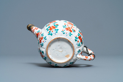 A polychrome petit feu and gilded Dutch Delft teapot and cover, early 18th C.