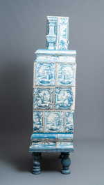 A composite stove with blue and white stove tiles, Nurnberg faience, Germany, 18th C.