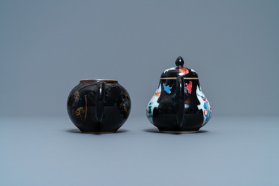 Two Chinese famille noire teapots, a pattipan and two spoon trays, Yongzheng/Qianlong