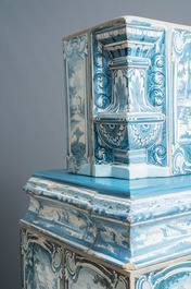 A composite stove with blue and white stove tiles, Nurnberg faience, Germany, 18th C.