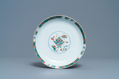 A Chinese capucine brown-ground famille verte plate and a bowl, Kangxi