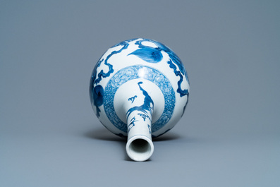 Een Chinese blauw-witte flesvormige vaas met boeddhistische leeuwen, Kangxi