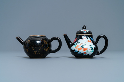 Two Chinese famille noire teapots, a pattipan and two spoon trays, Yongzheng/Qianlong