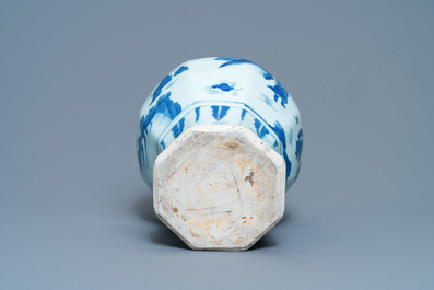 A Chinese blue and white vase with figures in a landscape, Transitional period