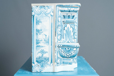 A composite stove with blue and white stove tiles, Nurnberg faience, Germany, 18th C.