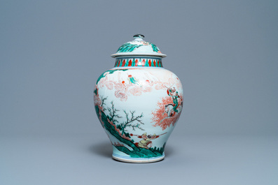 A Chinese famille verte vase and cover with an equestrian battle scene, Kangxi