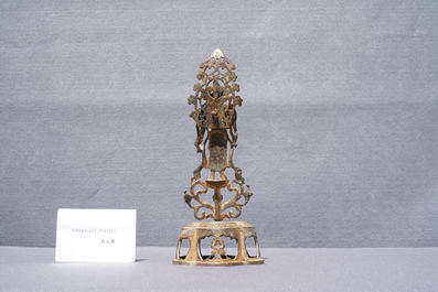 A Chinese gilt bronze figure of Buddha standing, probably Northern Wei dynasty