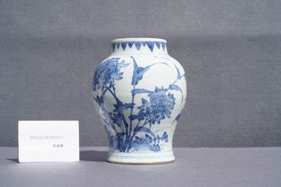 A Chinese blue and white vase with birds among blossoms, Transitional period