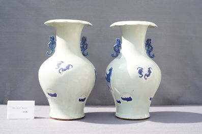 A pair of Chinese blue and white celadon 'horse' vases, 19th C.