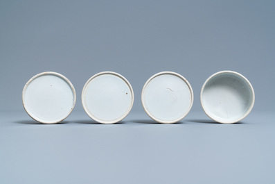 A pair of Chinese blue and white three-tier stacking boxes, a seal paste box and four saucers, 19th C.