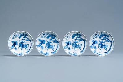 A pair of Chinese blue and white three-tier stacking boxes, a seal paste box and four saucers, 19th C.