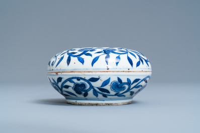 A pair of Chinese blue and white three-tier stacking boxes, a seal paste box and four saucers, 19th C.