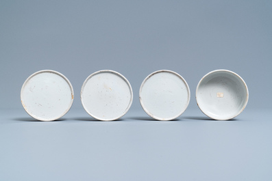 A pair of Chinese blue and white three-tier stacking boxes, a seal paste box and four saucers, 19th C.