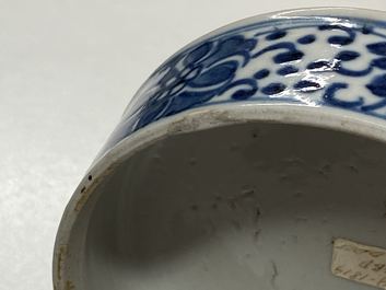 A pair of Chinese blue and white three-tier stacking boxes, a seal paste box and four saucers, 19th C.