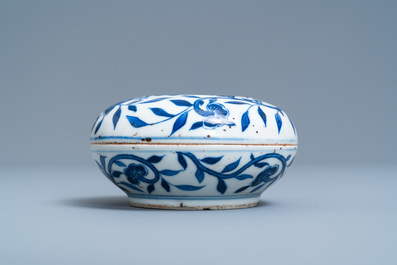 A pair of Chinese blue and white three-tier stacking boxes, a seal paste box and four saucers, 19th C.