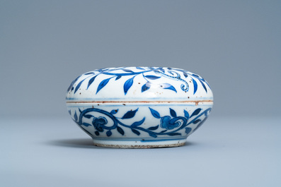 A pair of Chinese blue and white three-tier stacking boxes, a seal paste box and four saucers, 19th C.