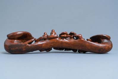 A large Chinese carved wooden ruyi scepter, 19th C.