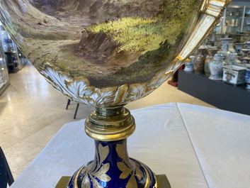 A pair of massive French S&egrave;vres-style vases with gilded bronze mounts, signed Desprez, 19th C.