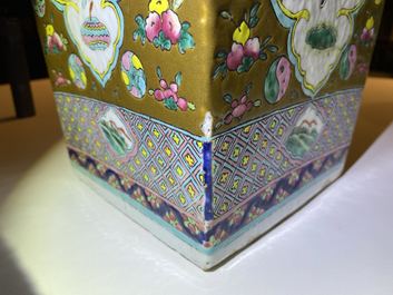 A pair of square Chinese famille rose brown-ground vases, 19th C.