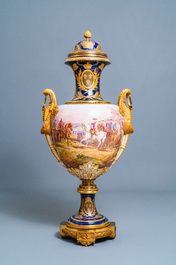 A pair of massive French S&egrave;vres-style vases with gilded bronze mounts, signed Desprez, 19th C.