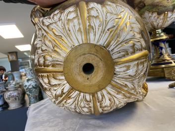 Une paire de tr&egrave;s grands vases en porcelaine dans le style de S&egrave;vres aux montures en bronze dor&eacute;, sign&eacute;s Desprez, France, 19&egrave;me