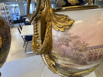 A pair of massive French S&egrave;vres-style vases with gilded bronze mounts, signed Desprez, 19th C.