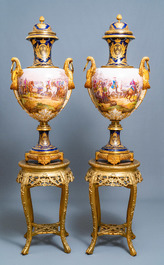 Une paire de tr&egrave;s grands vases en porcelaine dans le style de S&egrave;vres aux montures en bronze dor&eacute;, sign&eacute;s Desprez, France, 19&egrave;me